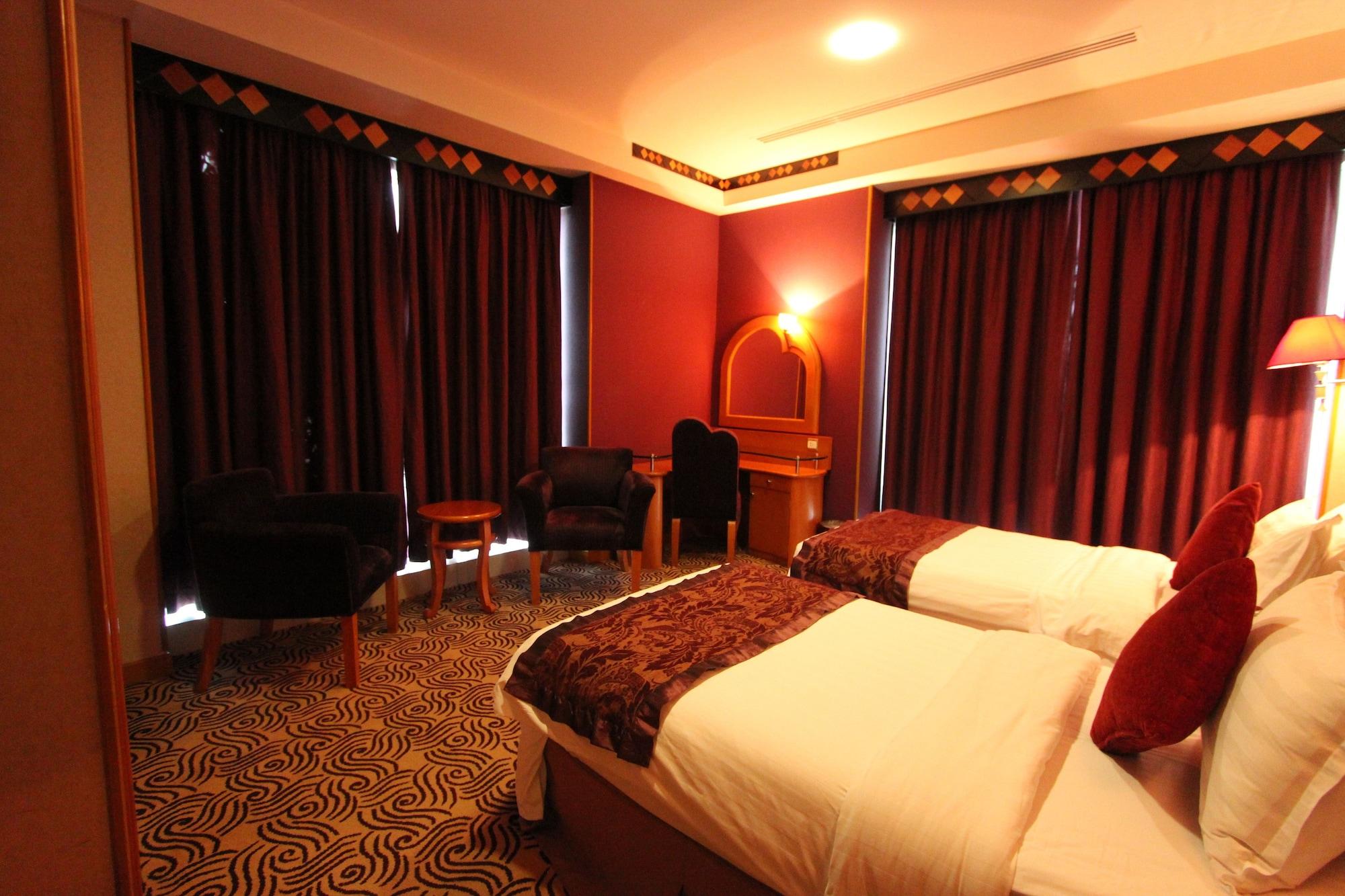 Awaliv International Hotel Ta'if Zewnętrze zdjęcie A room at the hotel