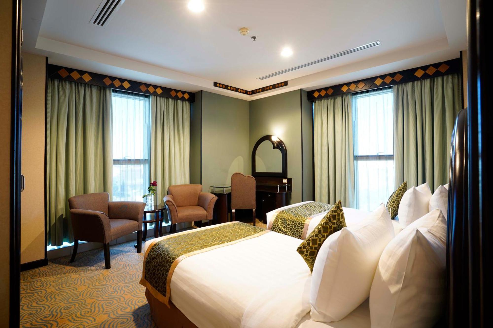 Awaliv International Hotel Ta'if Pokój zdjęcie A bedroom at the hotel